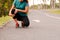 Fitness woman runner feel pain on knee. Outdoor exercise activities concept