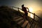 Fitness woman runner trail running on seaside mountain stairs