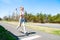 Fitness woman running on the street.