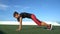 Fitness woman training core strength doing mountain climber bodyweight exercise