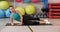 Fitness woman training legs muscles lying on carpet in gym club. Sport woman doing legs exercise on fitness carpet in