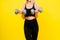 Fitness, workout and woman with weights in a studio for a arm or strength training with motivation.