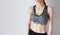 Fitness and Yoga Healthy Lifestyle Concept. Sporty Young Woman Wearing Black and Gray Sport Bra with Muscular Body and Strong Six