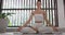 Fitness and Zen, Sporty Woman Meditation in Lotus Pose Indoors