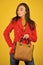 Fits perfect. Beauty brunette. Fashionable woman in jacket. Fashion autumn winter. female trendy beauty. handbag and