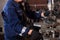 Fitter working on on an automatic welding machine