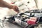 Fitting a car battery with wrench
