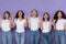 Five Amazed Ladies Pointing Fingers Up Standing Over Purple Background