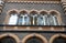 Five arched windows of a historic building in Bonn in Germany