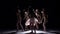 Five beautiful girls dancing modern contemporary dance, on black, shadow, slow motion