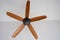 Five bladed ceiling fan hangs overhead from your ceiling