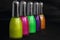 Five bottles of vibrant nail polish