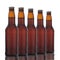 Five Brown Beer Bottles