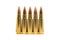 Five bullets isolated on white background. Cartridges 7.62 caliber for Kalashnikov assault rifle closeup