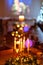 Five burning candles in a candelabra