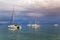 Five catamarans at anchor off the island Papeete