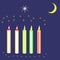 Five colored candles with moon