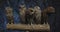 Five cute baby owls are sitting on branch and looking around moving their heads