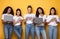 Five Diverse Ladies Using Modern Gadgets Browsing Internet, Yellow Background