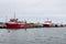 Five docked geophysical survey vessels lined up at New Bedford dock