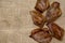 Five dried pork ears on burlap