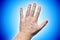 Five fingers - human hand, blue background