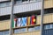 Five Flags Hanging Outside a High Rise Flat Balcony