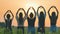 Five girls make a heart shape from their hands at sunset.