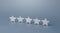 Five gray stars. Rating evaluation concept. Service quality. Buyer feedback. Popularity rating of a restaurant, hotel or mobile