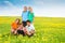 Five happy kids in dandelions