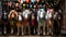 five horses are wearing bright colored hair for the camera and standing on a brick floor