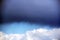 Five jet fighters in the sky against a rain cloud background