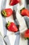 Five juicy strawberry on kitchen cloth
