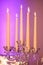 Five long burning candles set in a beautiful crystal candle holder with five scalloped bobeche