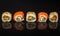 Five maki rolls in a row with salmon, avocado, tuna and cucumber isolated on black background. Fresh hosomaki pieces with rice and