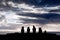 Five moai in silhouette in Easter Island