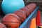 Five or more basketballs are placed in a row sports equipment physical education