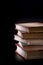 Five old books in atmospheric light