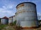 Five Old, Rusty Empty Silos