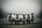 Five sheep lined up in a field on a misty day. Generative AI