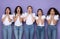 Five Shocked Multiracial Women Touching Face Posing Over Purple Background