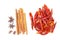 Five spices and dried chili peppers on white background