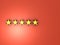 Five stars icon. Three golden stars on the red wall. High score and high rating symbol.