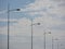 Five street lamps in a row