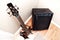 Five string bass guitar and amplifier