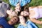 Five students relaxing outside