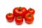 Five tomatos on white background
