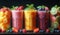 Five types of smoothie in different glasses. A lineup of smoothie cups filled