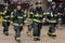 Five volunteer firemen finishing the 9/11 StairclimbFi