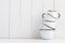 Five white enameled mugs